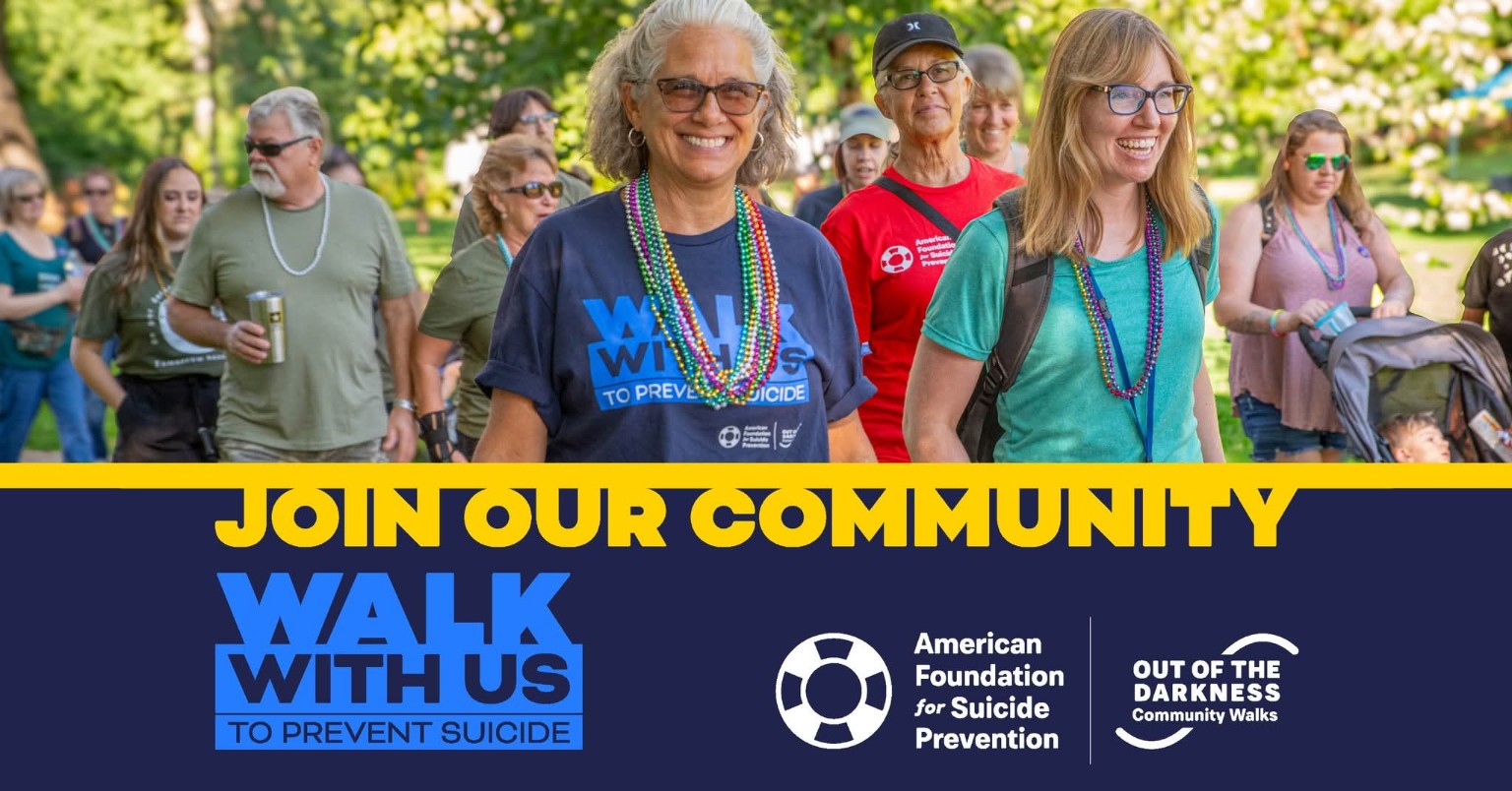 Promotional image for the Out of the Darkness Community Walks, showing participants walking together in support of suicide prevention.