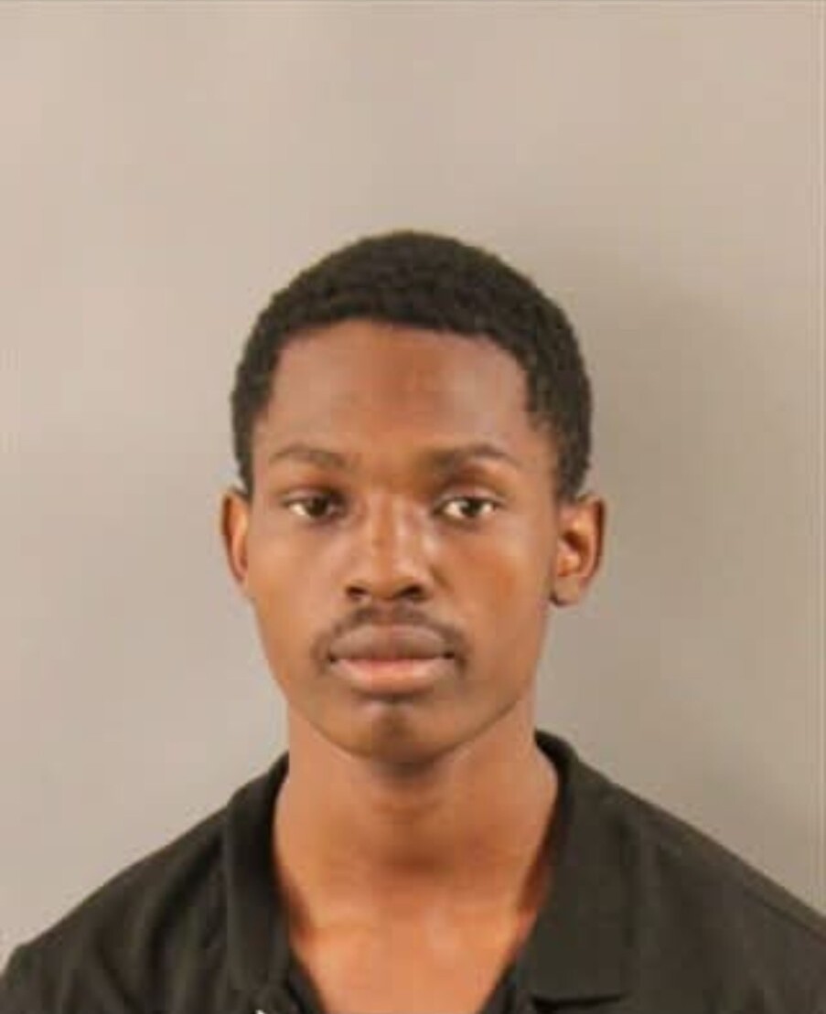 Booking photograph of Kabongo Moses Dingao.